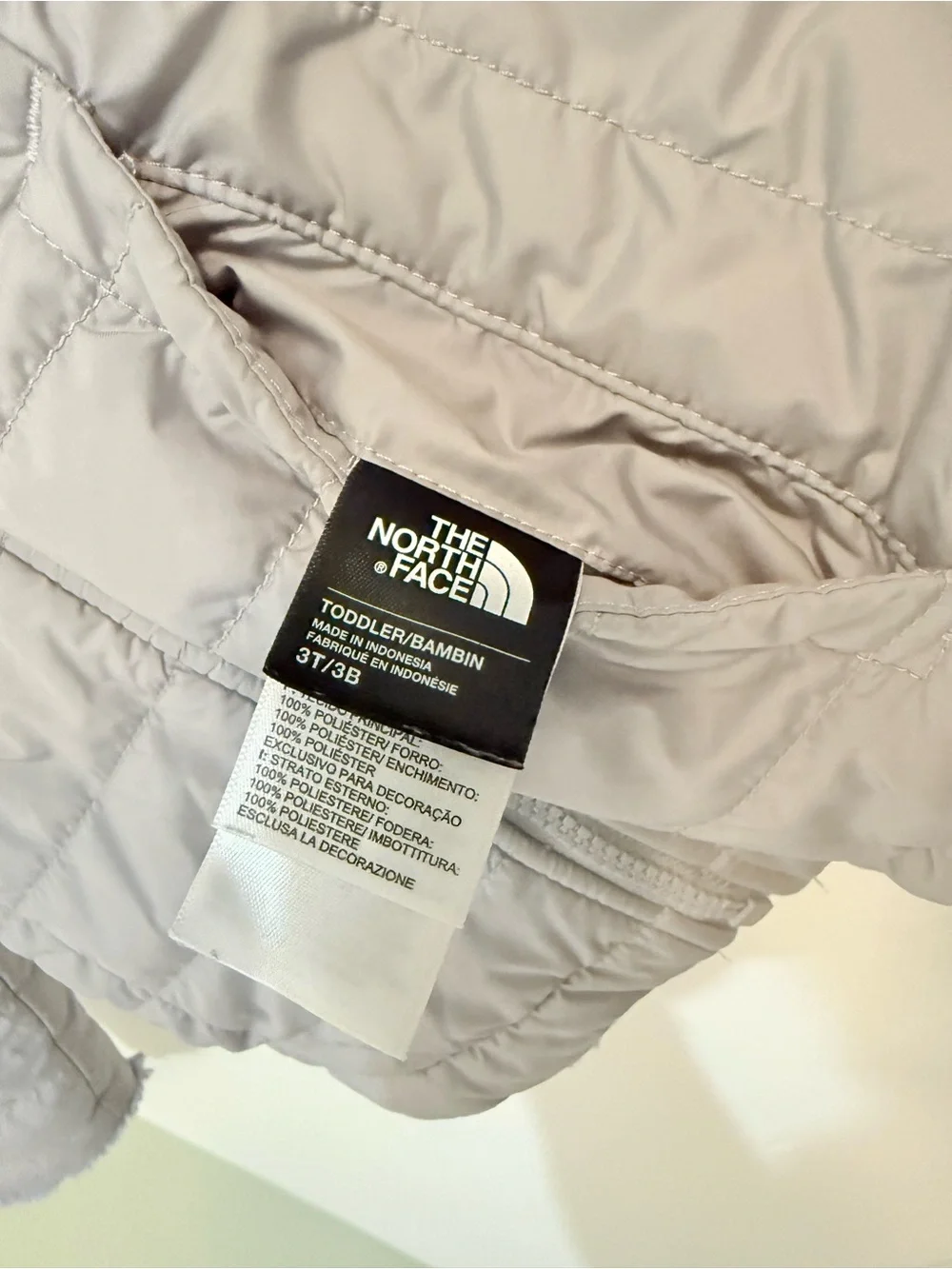 The North Face Light Gray Reversible Puffer Jacket with Purple Lining
